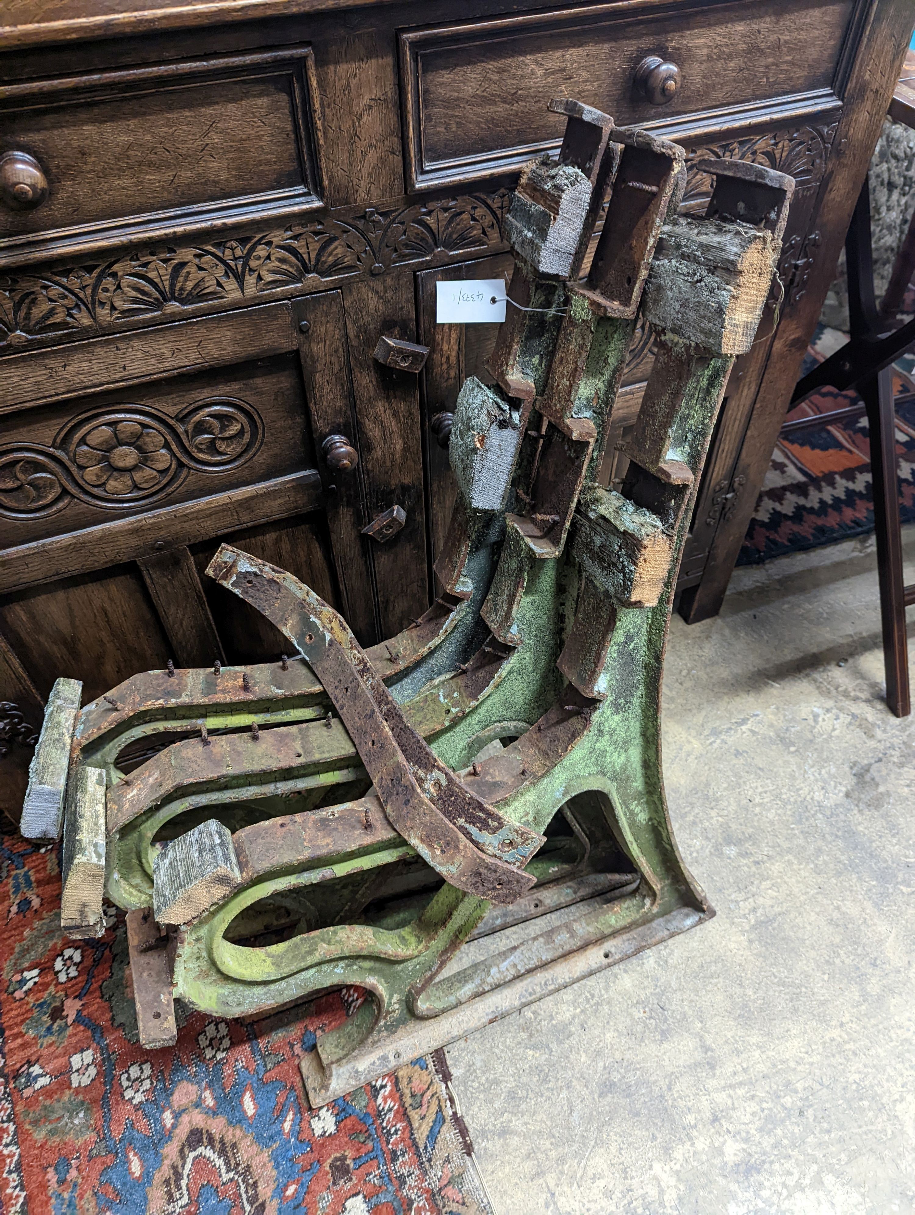 An early 20th century cast iron three section bench frame, probably marine or municipal, height 85cm